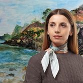 Watercolour Picture of the Scottish Coastline and a model wearing Coast silk Scarf.