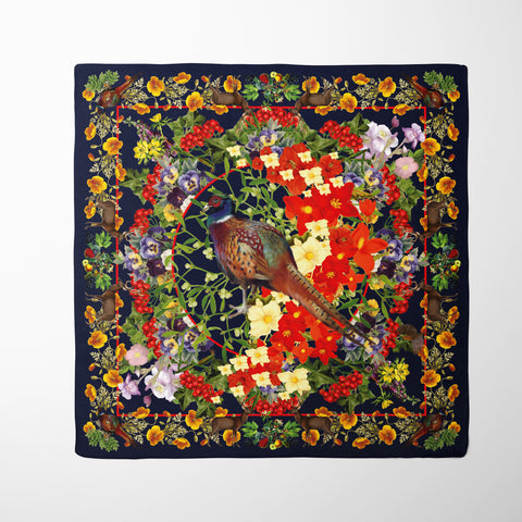 Exquisite Pheasant  Silk Scarf. Rich brown tones and vibrant floral bursts create a captivating design. Crafted from 100% silk twill with meticulous hand-stitched detailing. Presented in a Silktopia box, a perfect gift. Shop now and make a refined statement.