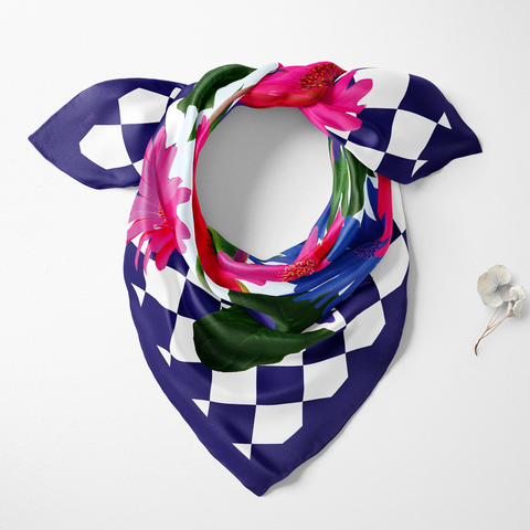 Colorful floral scarf with a checkered pattern on a white background