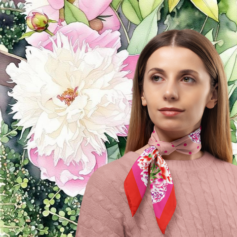 Woman wearing a colourful scarf with a floral background