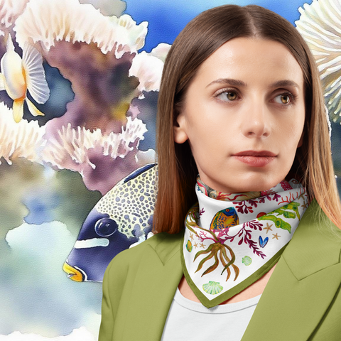 Woman wearing a colorful scarf with an underwater-themed background featuring fish and coral.