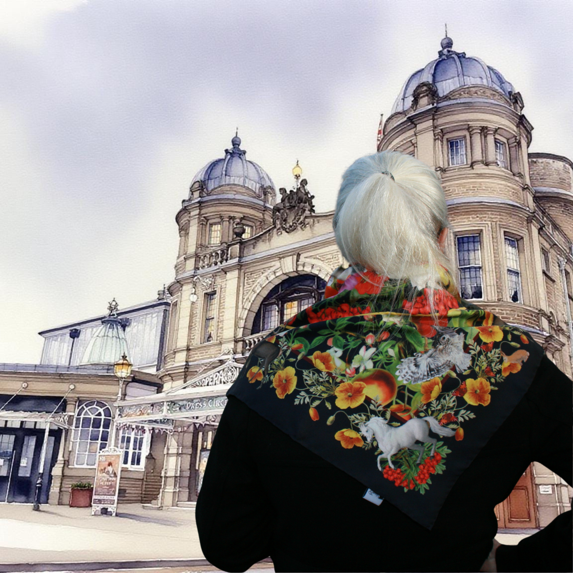 Person wearing a floral patterned scarf with a building in the background